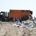 Виспати сміття допомагають місцеві бомжі
