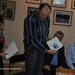 Микола Охріменко виступає у президії на презентації збірки віршів "Калинове сонце" Євгена Постульги